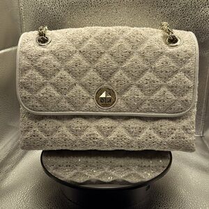 Stunning cloth Kate Spade. Can be handbag or crossbody with adjustable straps